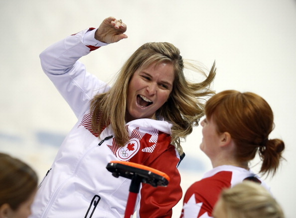 Canada’s Skip Jennifer Jones celebrates after throwing the last stone to win the game during the women’s semi-final match between Great Britain and Canada at the Ice Cube curling centre in Sochi on February 19, 2014 during the 2014 Sochi winter Olympics.
