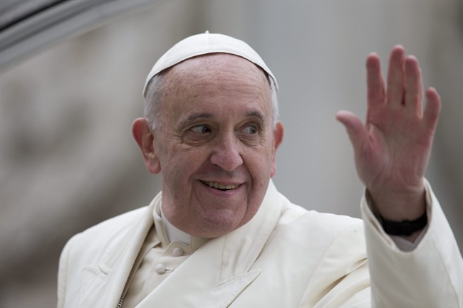Pope Francis waves as he leaves at the end of his weekly general audience in St. Peter's Square at the Vatican, Wednesday, Feb. 5, 2014.