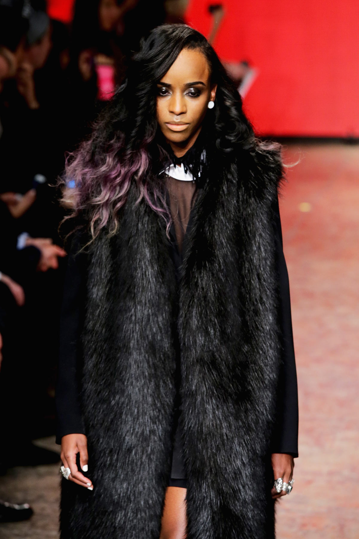 Musician Angel Haze walks the runway at the DKNY Women's fashion show during Mercedes-Benz Fashion Week Fall 2014 on February 9, 2014 in New York City.