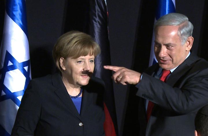 In this video-grab, German Chancellor Angela Merkel (L) and Israeli Prime Minister Benjamin Netanyahu gesture during a joint press conference after their cabinets held a meeting at the King David hotel in Jerusalem on February 25, 2014. 
