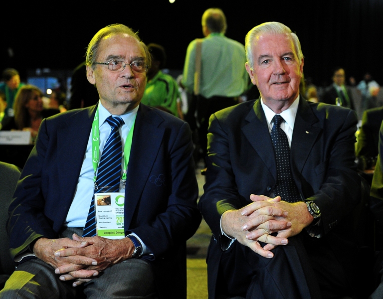 Craig Reedie (R), the new president of the World Anti-Doping Agency (WADA), and outgoing Vice President Arne Ljungqvist attend a session of the 2013 World Conference on Doping in Sports in Johannesburg, on November 15, 2013. World sports leaders are meeting in Johannesburg to decide the future of the anti-doping battle, a year after cyclist Lance Armstrong's fall from glory. AFP PHOTO / ALEXANDER JOE .