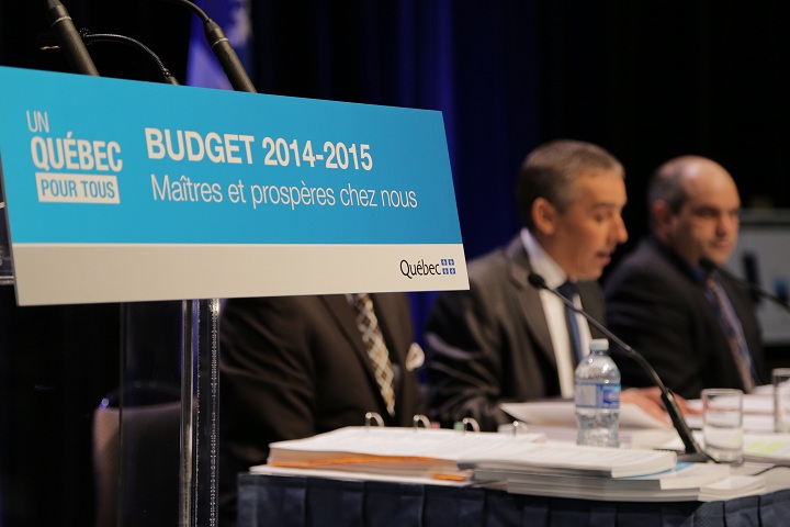 Quebec's finance minister Nicolas Marceau talks to reporters about the budget tabled on February 20, 2014.