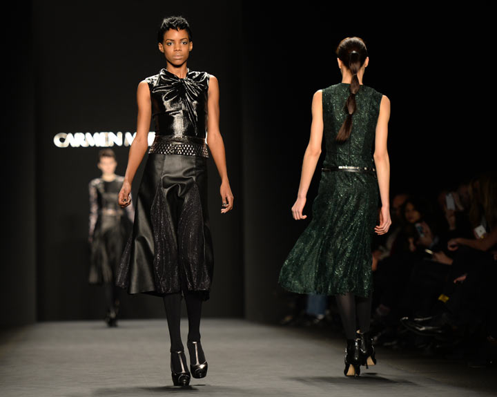 A model presents an outfit by Carmen Marc Valvo during the Mercedes-Benz Fashion Week Fall/Winter 2014 shows February 7, 2014 in New York.