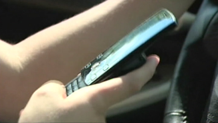 Saskatchewan judge rules just looking at your cell phone while behind the wheel is not breaking the law.