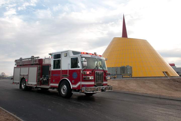 A Bowling Green Fire Department truck moves into place Wednesday, Feb. 12, 2014, at the scene of a sinkhole collapse inside the dome at the National Corvette Museum in Bowling Green, Ky. The sinkhole swallowed eight cars in the museum’s collection.