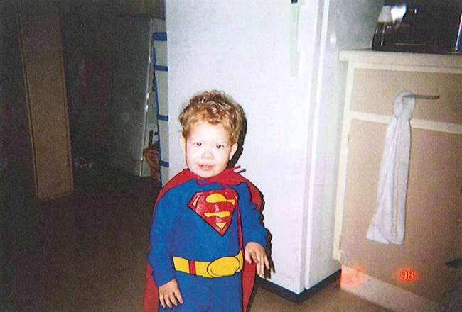 Jeffrey Baldwin is shown in a Halloween costume in this undated handout photo released at the inquest into his death.