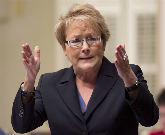 Quebec Premier Pauline Marois responds to Opposition questions Thursday, December 5, 2013 at the legislature in Quebec City. Marois is reviving discussion about whether her Parti Quebecois government should hold another sovereignty referendum — but says such a vote would happen only when the population is ready.THE CANADIAN PRESS/Jacques Boissinot.