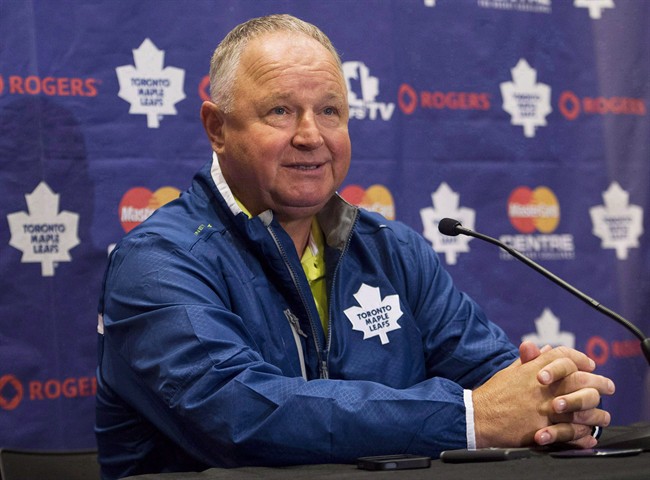 Toronto Maple Leafs coach Randy Carlyle speaks to the media during NHL opening day training camp in Toronto on Wednesday, Sept. 11, 2013. Sixty games into the NHL season, Carlyle and the Leafs find themselves back to square one. THE CANADIAN PRESS/Nathan Denette.