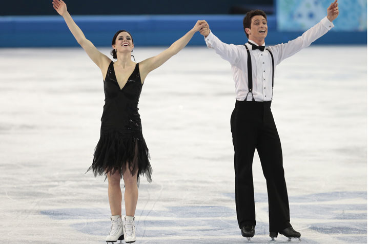 Tessa Virtue and Scott Moir of Canada compete in the team ice dance short dance figure skating competition on Saturday, Feb. 8, 2014, in Sochi.