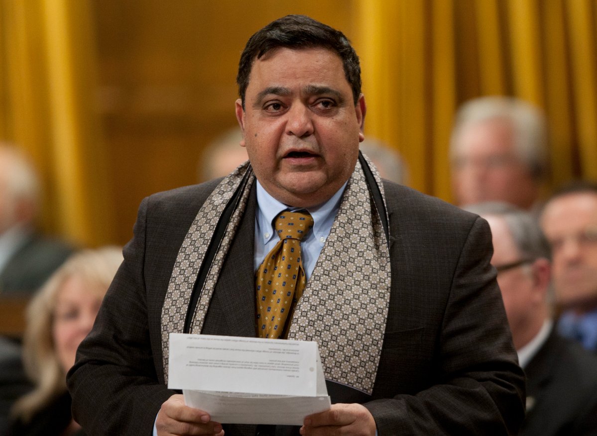 Conservative MP for Calgary East Deepak Obhrai rises during Question Period in the House of Commons in Ottawa, Thursday February 2, 2012. THE CANADIAN PRESS IMAGES/Adrian Wyld.