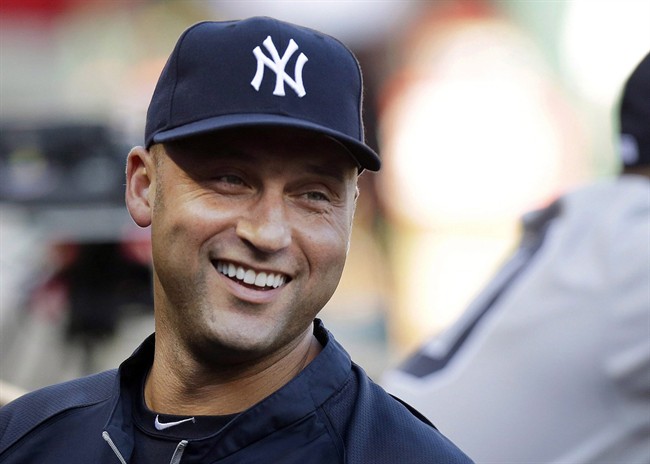 In this July 22, 2013, New York Yankees shortstop Derek Jeter laughs in Arlington, Texas. 