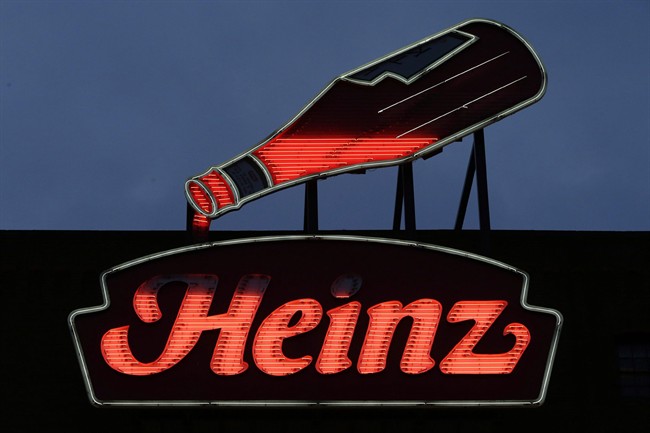 In this Feb. 14, 2013 photo, an animated neon Heinz Ketchup bottle sits in Pittsburgh.