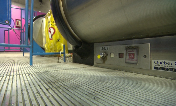 The emergency stop button at the bottom of the escalator in Montreal’s Fabre metro station.