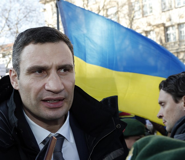 Ukraine's opposition leader Vitali Klitschko joins a demonstration to support the opposition during the 50th Security Conference in Munich, Germany, Saturday, Feb. 1, 2014. The conference on security policy takes place from Jan. 31, 2014 to Feb 2, 2014. (AP Photo/Frank Augstein).