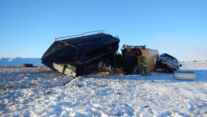 Woman killed in a crash near Biggar, Saskatchewan related to two children who were on the school bus, one of two vehicles involved in the collision.