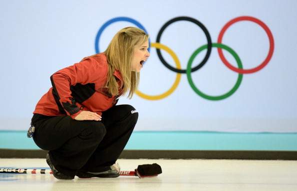 Canadian Jennifer Jones reacts as she throws the stone during the 2014 Sochi winter Olympics women’s curling round robin session 4 match against Great Britain at the Ice Cube curling centre in Sochi on February 12, 2014. Jones and Canada’s undefeated women’s team plays twice on Thursday, taking on Denmark and Switzerland.