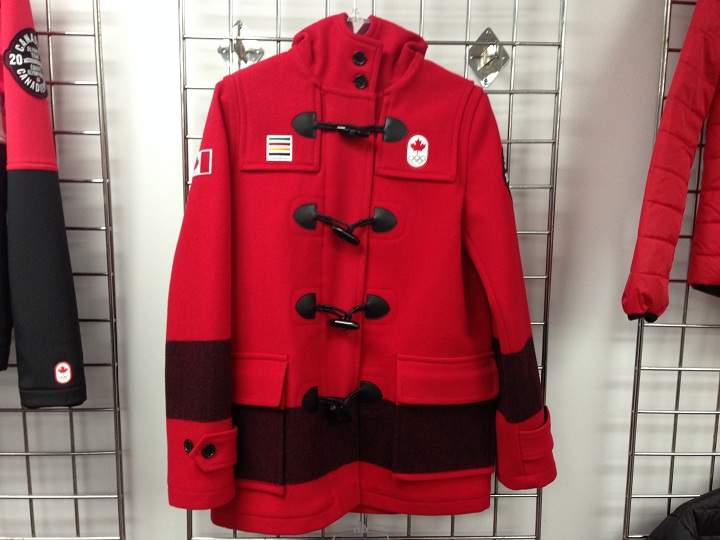 One of the Olympic team’s red duffle jackets hangs at Freed & Freed in Winnipeg. Feb. 21 2014 Winnipeg