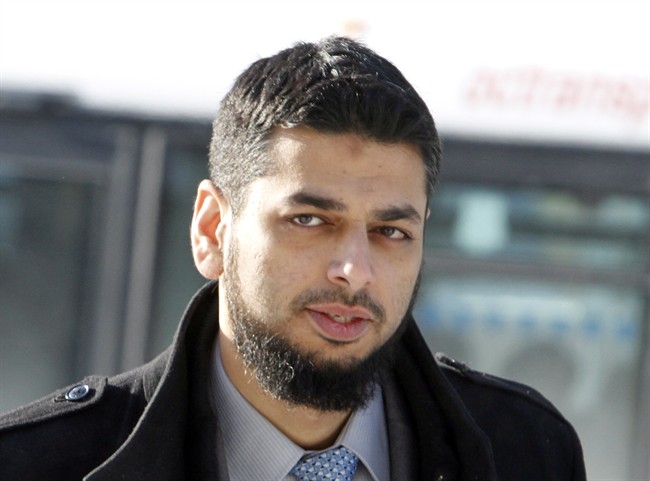 Khurram Syed Sher arrives to face trial on a terrorism charge at the Ottawa court house in Ottawa on Monday, February 10, 2014.THE CANADIAN PRESS/Fred Chartrand.