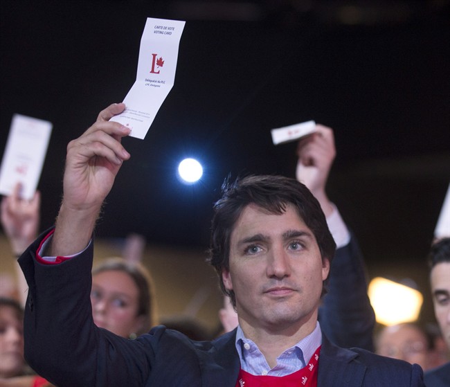Federal Liberal leader Justin Trudeau votes on a resolution during the party's biennial convention in Montreal, Sunday, February 23, 2014.