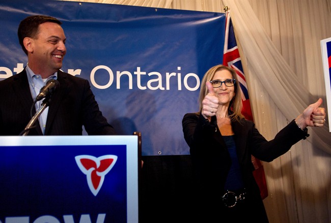 Ontario PC candidate for Thornhill Gila Martow celebrates a victory in the Thornhill by-election with Ontario PC leader Tim Hudak by her side, Thursday February 13, 2014. 