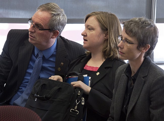 Lawyers Ronald MacDonald, Amy Sakalauskas and Elaine Craig, left to right, wait to make a presentation regarding Trinity Western University's proposed law school to the Nova Scotia Barristers' Society executive committee in Halifax on Thursday, Feb. 12, 2014.
