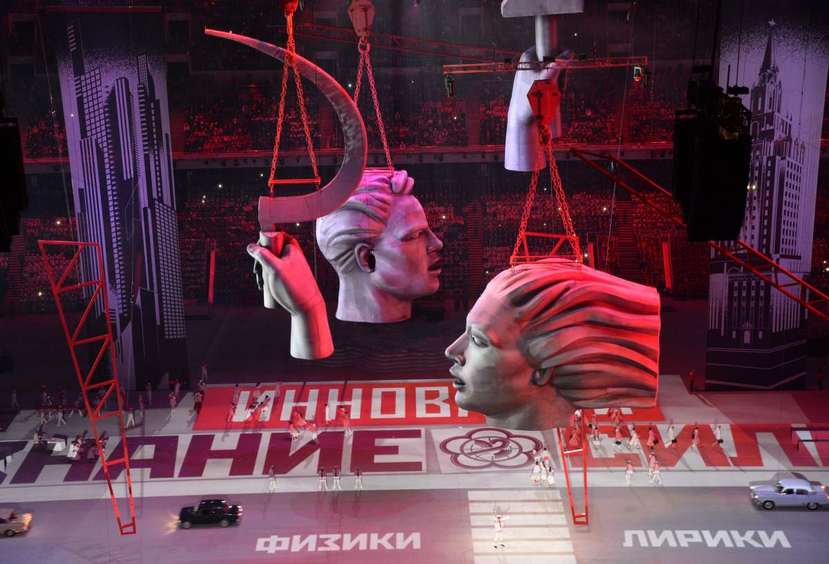 A picture taken with a robotic camera shows cars and sculptures moving across the stage during the Opening Ceremony of the Sochi Winter Olympics at the Fisht Olympic Stadium on February 7, 2014 in Sochi. (Antonin Thuiller/AFP/Getty Images)