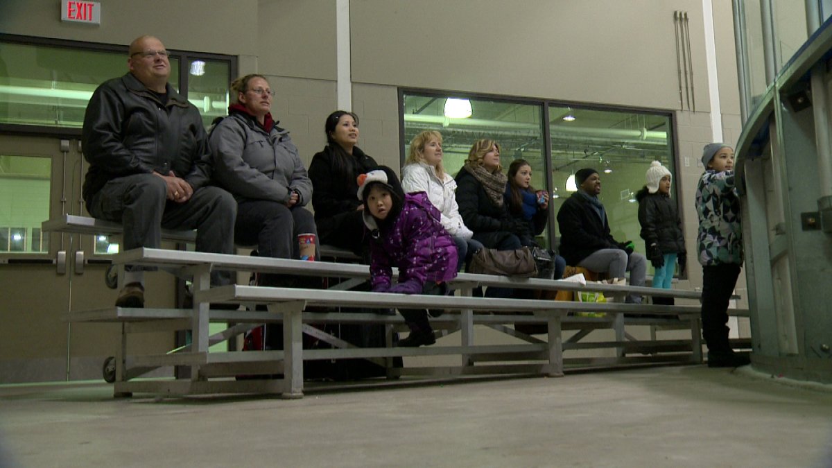 Parents watch their children play hockey in the Co-operators Centre Saturday morning.