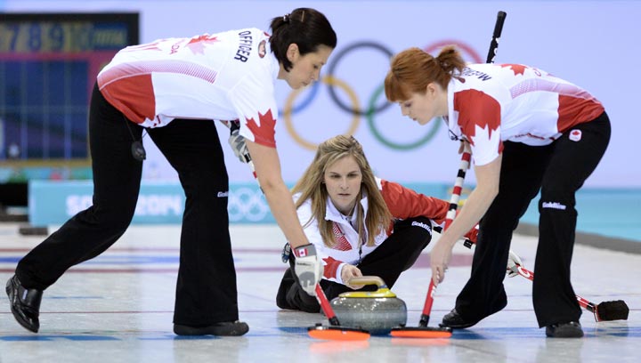 Canada's Jennifer Jones throws the stone during the Women's Curling Round Robin Session 1 at the Ice Cube Curling Center during the Sochi Winter Olympics on February 10, 2014.  