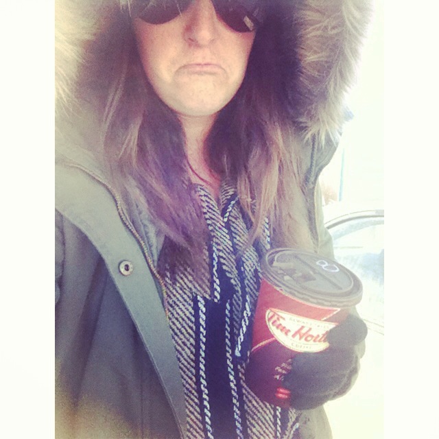 At least Kristin has a coffee to keep her warm