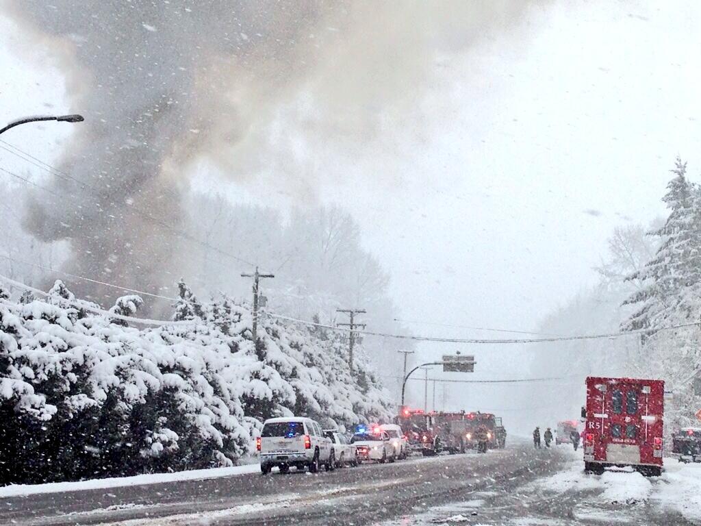 Fire crews battled a blaze at a building licensed to grow medical marijuana in Langley. 