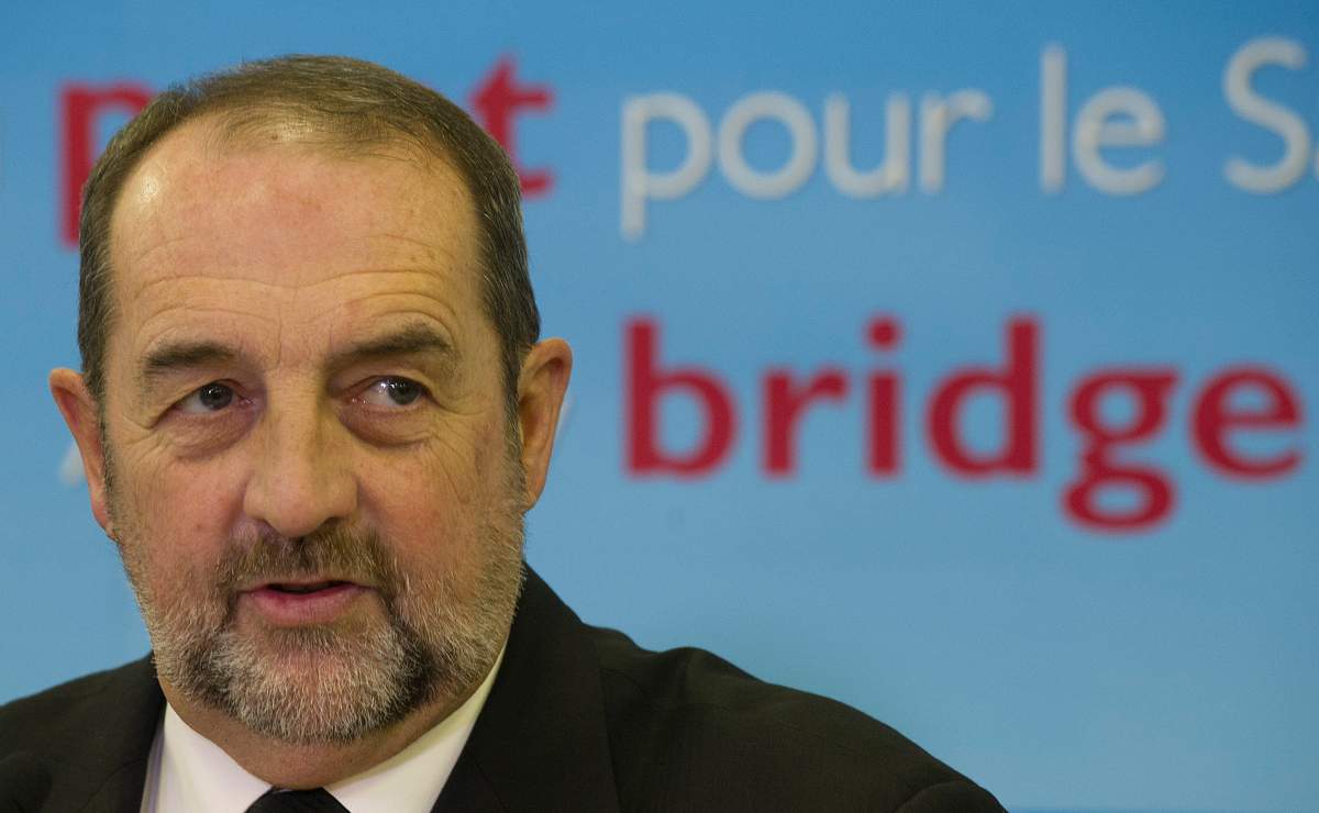 Infrastructute Minister Denis Lebel speaks at a news conference in Montreal, Sunday, December 1, 2013. THE CANADIAN PRESS IMAGES /Graham Hughes.