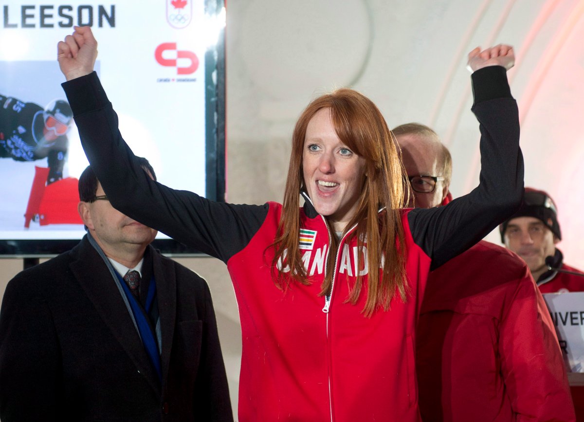 Marianne Leeson of Burlington, Ont. reacts after receiving her team jacket and being named to the Canadian Olympic snowboard team in Quebec City,, Tuesday, January 21, 2014.