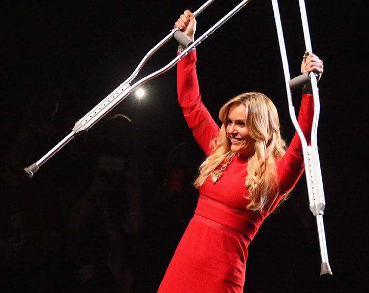 Olympic Skier Lindsey Vonn walks the runway at Go Red For Women The Heart Truth Red Dress Collection fashion show during Mercedes-Benz Fashion Week at The Theatre at Lincoln Center on February 6, 2014 in New York City.