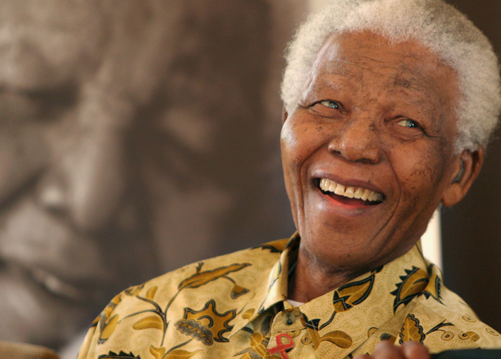 In this Dec. 7, 2005 file photo, former South African President Nelson Mandela, 87, smiles the Mandela Foundation in Johannesburg. On Thursday, Dec. 5, 2013, Mandela died at the age of 95.