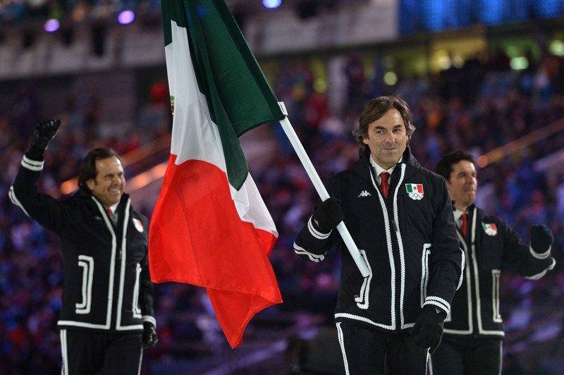 Mexico’s flag bearer, alpine skier Hubertus Von Hohenlohe, leads his national delegation during the Opening Ceremony of the 2014 Sochi Winter Olympics at the Fisht Olympic Stadium on February 7, 2014 in Sochi. AFP PHOTO / ALBERTO PIZZOLI (ALBERTO PIZZOLI/AFP/Getty Images)