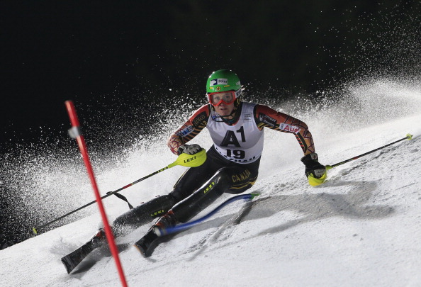 Erin Mielzynski of Canada races down the floodlit slope during the first round of the slalom race of the FIS Ski World Cup in Flachau, Austria, on January 14, 2014. 