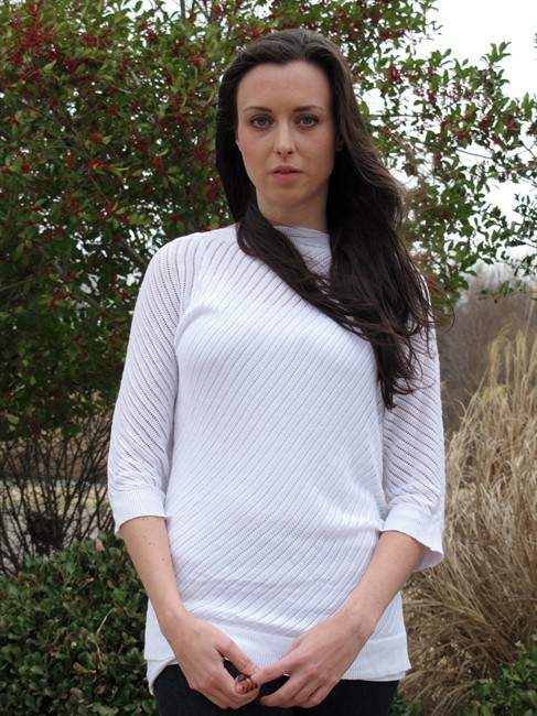 Meaghan Ybos poses for a photo at Shelby Farms as she discusses Memphis' backlog of untested rape kits on Thursday, Feb. 20, 2014, in Memphis, Tenn. Ybos, a victim of rape, has been crusading for legislation to address the backlogs for several years. (AP Photo/Adrian Sainz).