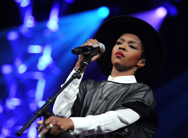 Singer Lauryn Hill performs at Amnesty International's "Bringing Human Rights Home" Concert at the Barclays Center on Wednesday, Feb. 5, 2014 in New York.
