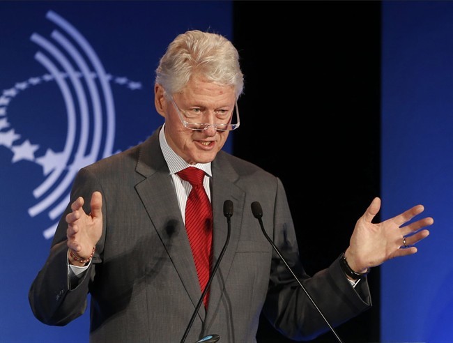 FILE - In this Monday, Dec. 9, 2013, file photo, former President Bill Clinton speaks at a CGI Clinton Global Initiative Latin America event at the Copacabana Palace in Rio de Janeiro.