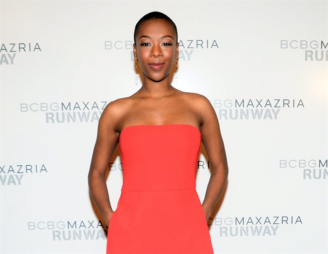 This image released by BFA NYC shows actress Samira Wiley, a cast member from the Netflix series, "Orange is the New Black," wearing an orange jumpsuit at the Fall 2014 BCBG Max Azria show during Fashion Week in New York, Thursday, Feb. 6, 2014. 