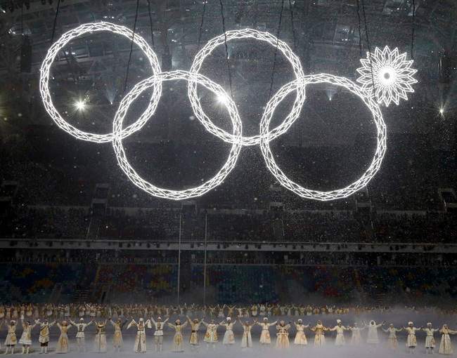 One of the rings forming the Olympic Rings fails to open during the opening ceremony of the 2014 Winter Olympics in Sochi, Russia, Friday, Feb. 7, 2014.