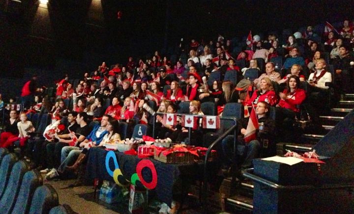Dozens of people, dressed in their Team Canada gear, watched as Kaetlyn Osmond helped Team Canada claim Olympic silver in Sochi Sunday, Feb. 9, 2014.