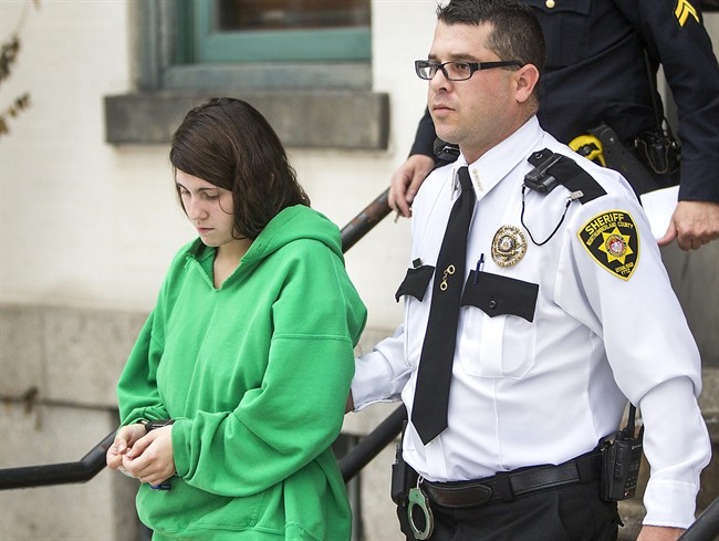 In this Dec. 20, 2013 file photo, Miranda Barbour is led out of the courthouse after her preliminary hearing in Sunbury, Pa. Police haven't substantiated Barbour's claims that she killed more than 20 people in four states before the killing she's now charged with committing with her newlywed husband, a prosecutor said Tuesday, Feb. 18, 2014. 