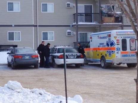 Winnipeg police take a suspect into custody after a raid at 1167 St. Anne’s Rd.