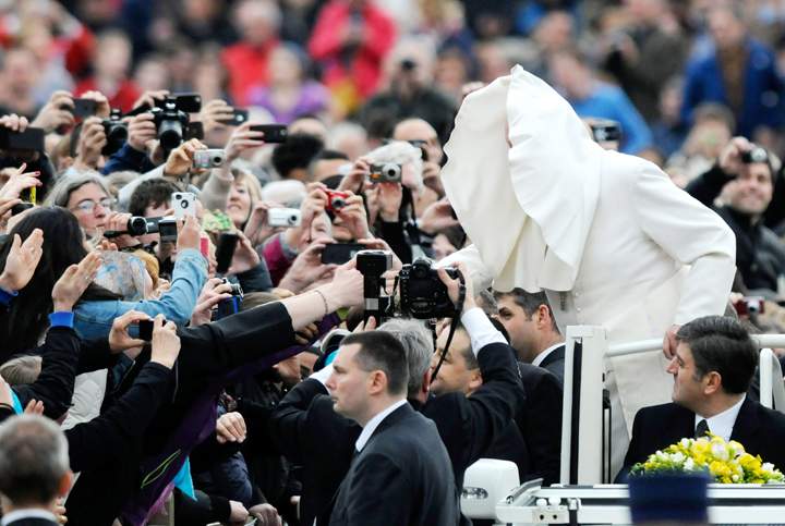 Pope Francis vs. wind: Pontiff battles strong breeze during address - image