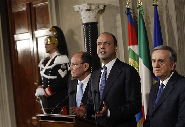 Nuovo Centrodestra (New Centre-Right) party' s leader Angelino Alfano, center, flanked by senators Maurizio Sacconi, right, and Renato Schifani, talks to journalists after talks with Italian President Giorgio Napolitano, at the Quirinale presidential palace, in Rome, Saturday, Feb. 15, 2014. Napolitano is consulting with political party leaders to determine if Democratic Party leader Matteo Renzi has enough support to form a new government. Renzi, 39, accelerated his path to the premier's post this week by engineering Enrico Letta's resignation within the party.