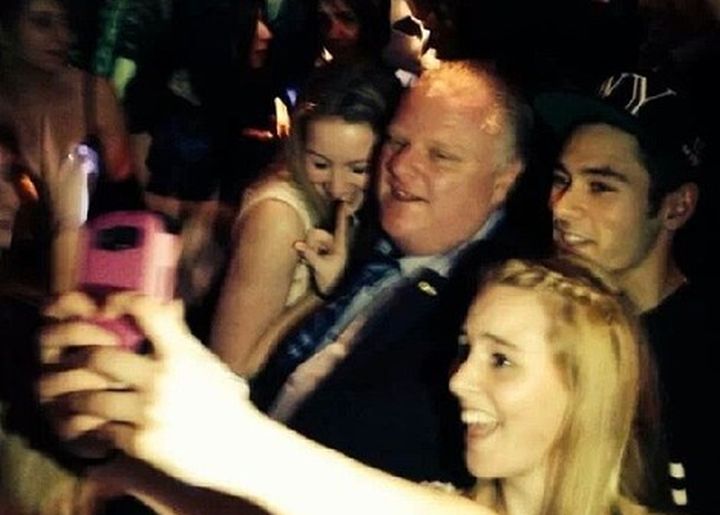 Toronto mayor Rob Ford poses for pictures with fans at the Foggy Dew Pub in Coquitlam Friday. 