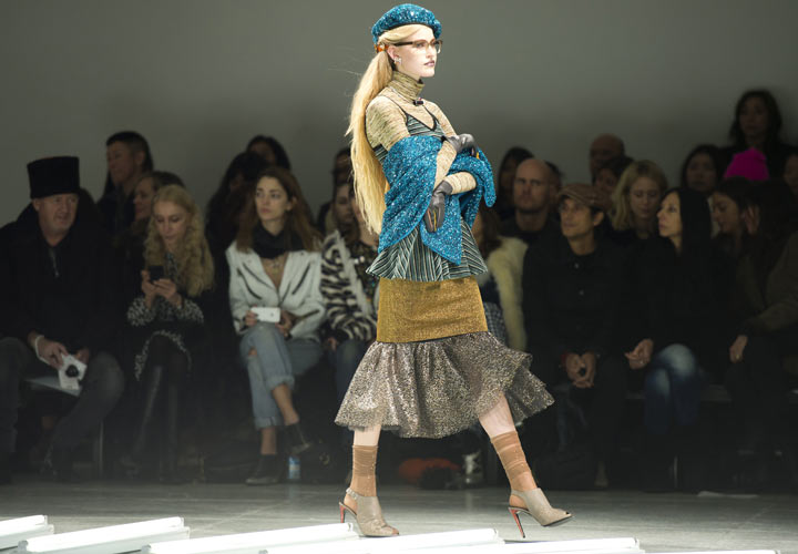 A model wears designs by Rodarte during the Mercedes-Benz Fashion Week Fall/Winter 2014 shows February 11, 2014 in New York.