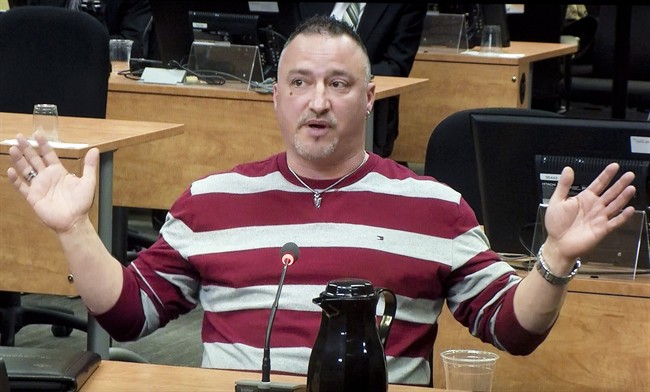 Bernard (Rambo) Gauthier is seen on a screen broadcasting the Charbonneau inquiry looking into corruption in the Quebec construction industry Tuesday, February 25, 2014 in Montreal.