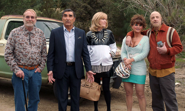 Eugene Levy, second from left, in a scene from the pilot for 'Schitt's Creek.'.